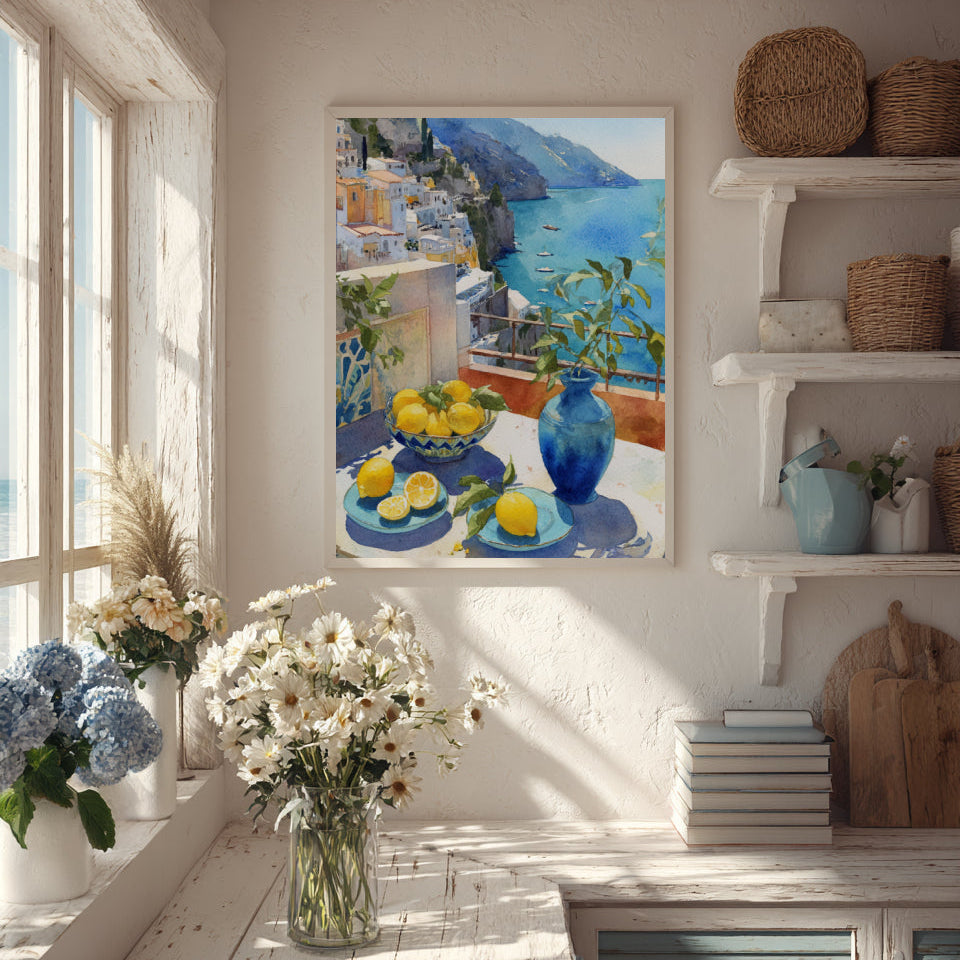 Room interior with a painting of a coastal Italian scene, flowers, and books.