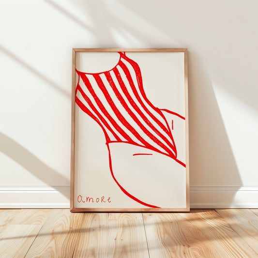 Framed abstract swimwear art with red lines on a white wall