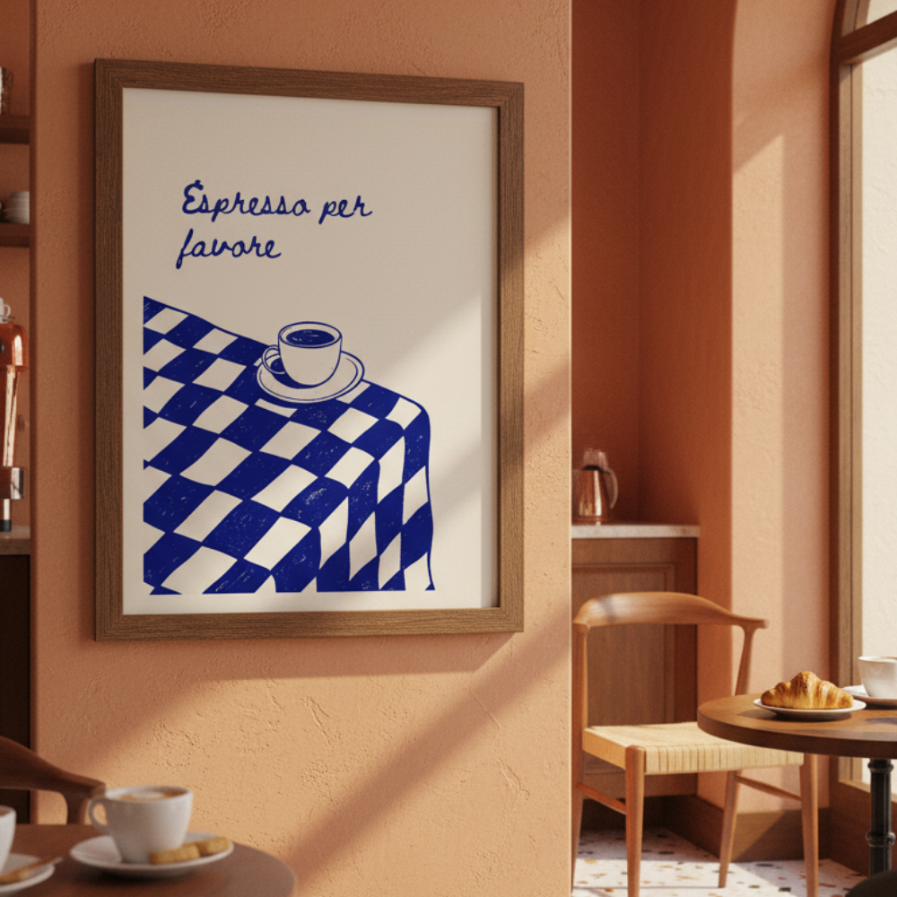 Framed artwork with a coffee cup and checkered tablecloth design on a wall in a cozy room.