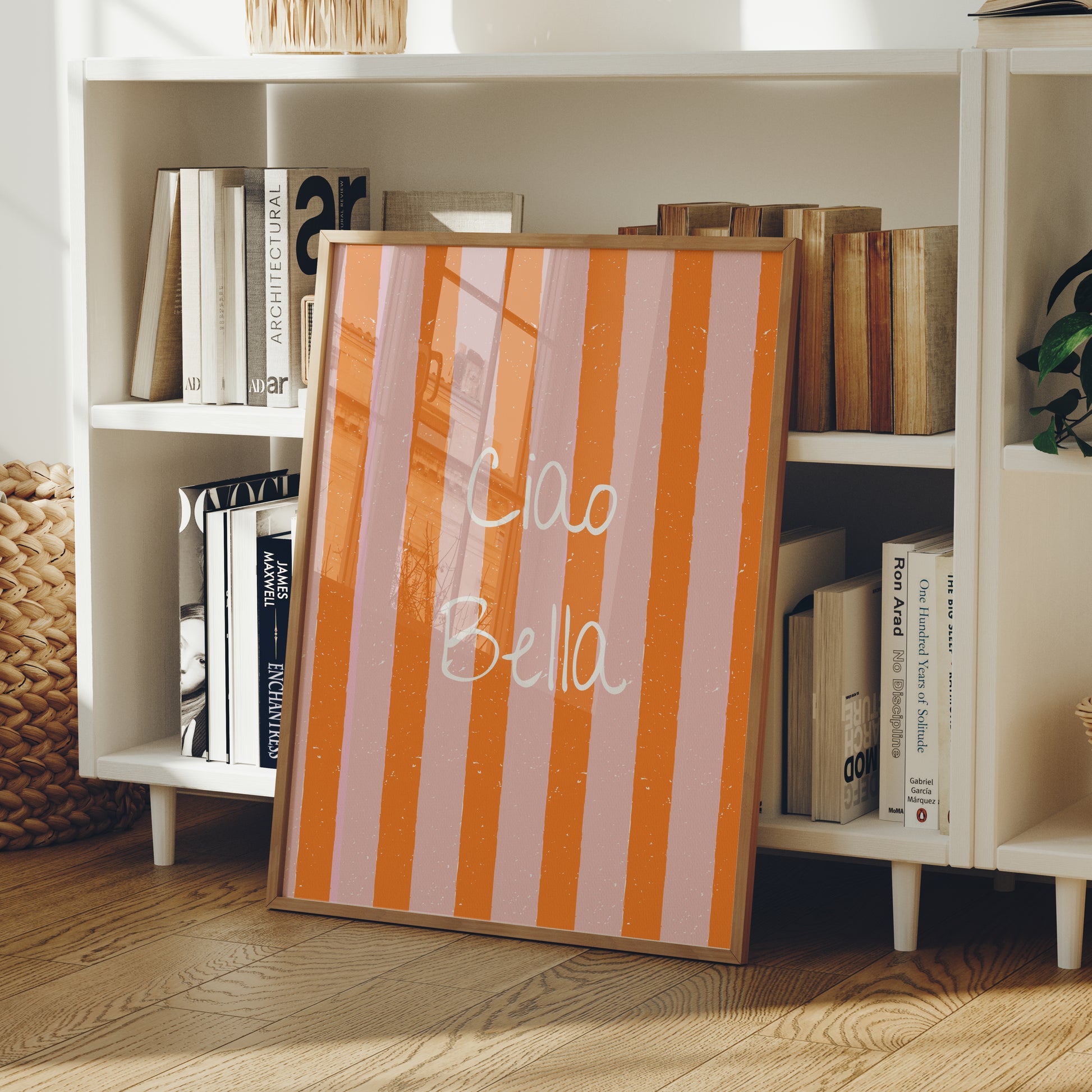 Striped frame with 'Ciao Bella' text on a bookshelf background