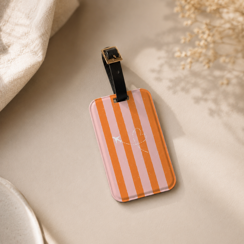 Striped luggage tag on a neutral background